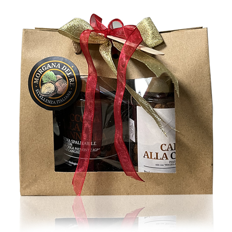 morgana-del-re-confezione-natalizia-borsa-con-finestra-con-crema-e-praline–nocciola-bio-langhe Immagine della borsa natalizia morgana del re contenente 1 crema spalmabile alla nocciola e un vasetto di nocciole pralinate